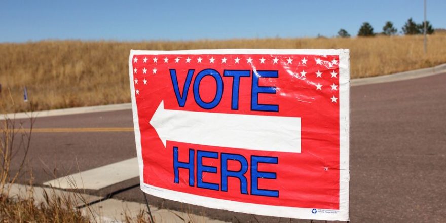 Voting sign indicating a voting location