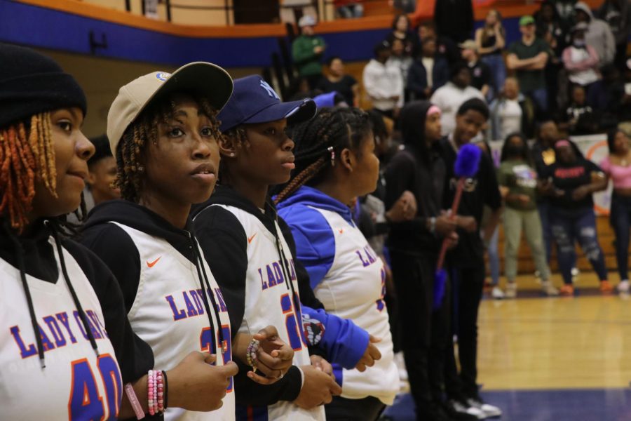 The Richland Northeast girls basketball team sings the RNE Alma Mater together. Their team were recognized during the Winter sports pep rally. 