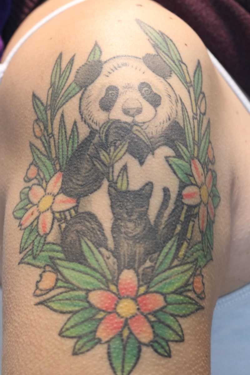 Ladymons+panda+tattoo+on+her+right+arm.