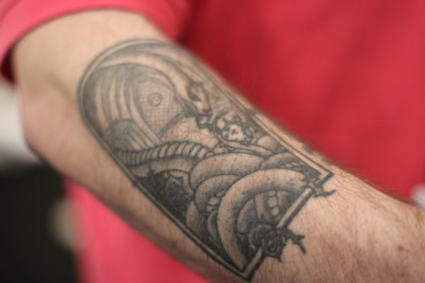 One of history teacher Kyle Sanders arm tattoos, all of which are closely connected to his childhood, he says.