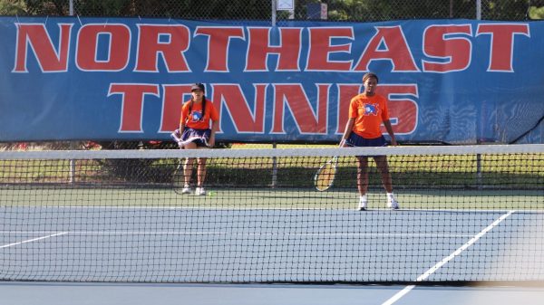 Juniors Malia Johnson and Fabiola Gutierrez-Morente play doubles against Dreher High School.