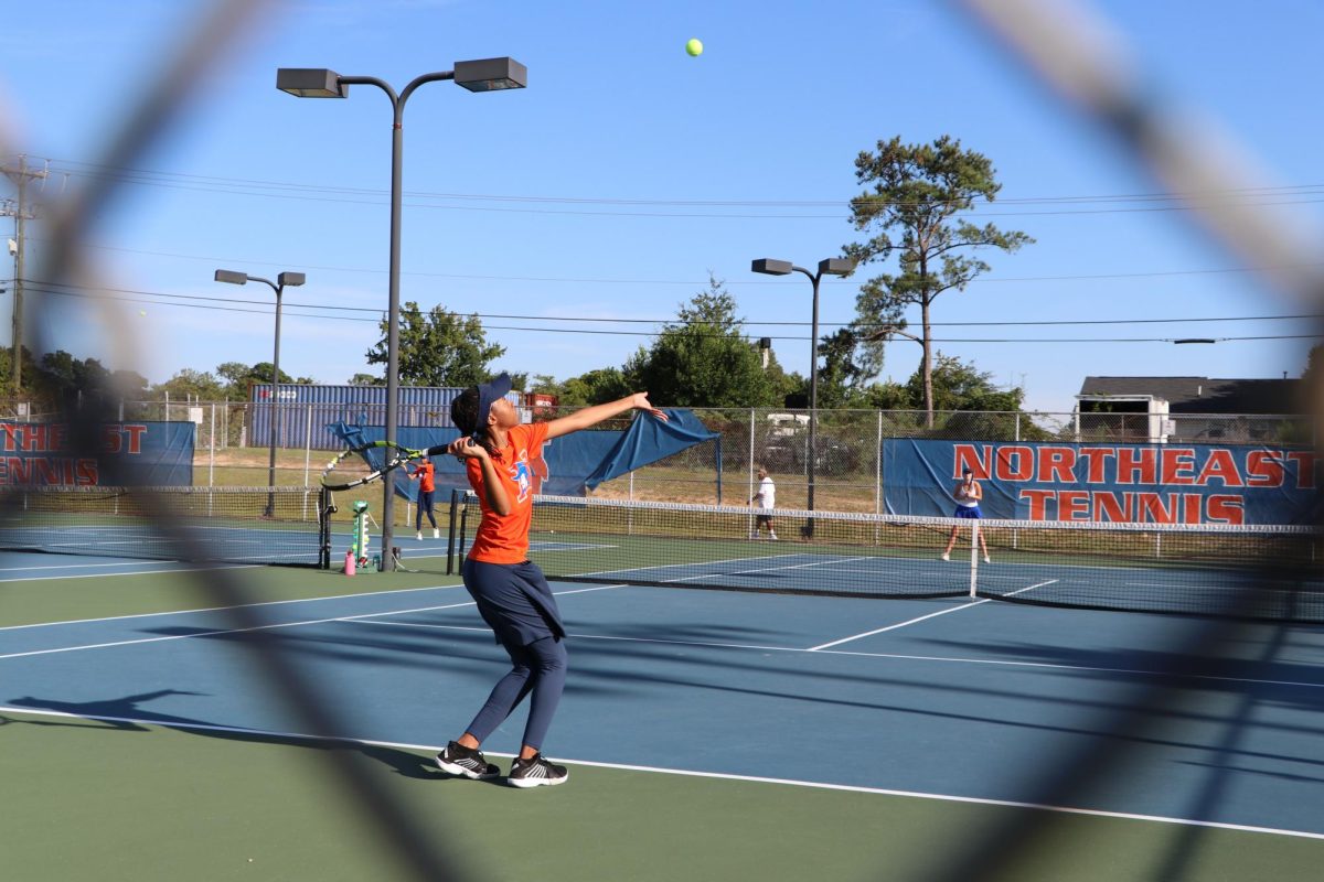 Serving the tennis ball