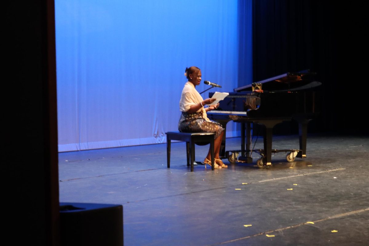 This teacher recited on of her student's poem and then sung a gospel 