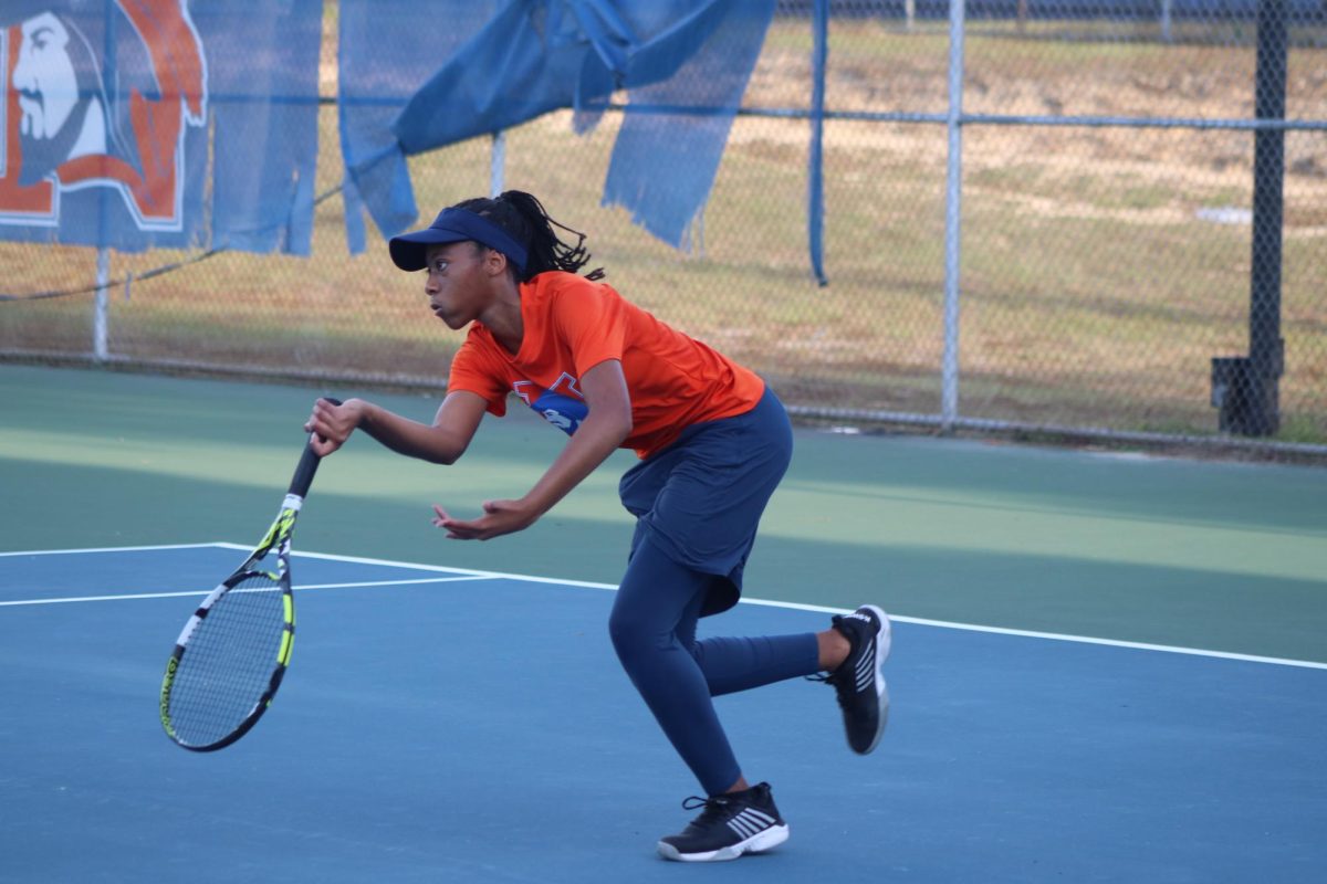 Naomi Williams sets up to hit the ball.