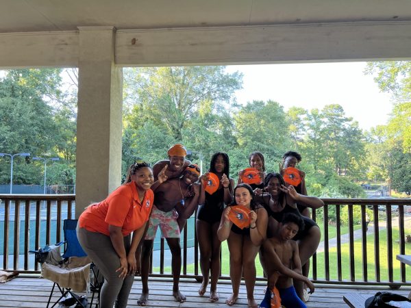 2024 Richland Northeast Swim team pose for group photo post Swim meet. 