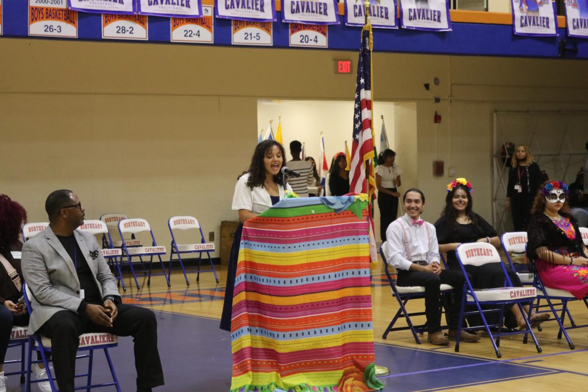 Student Body President Dulce Calix-Echeverriav orates at the Hispanic Heritage Month pep rally. She has pushed SGA to spotlight RNE's Hispanic population with her presidency.