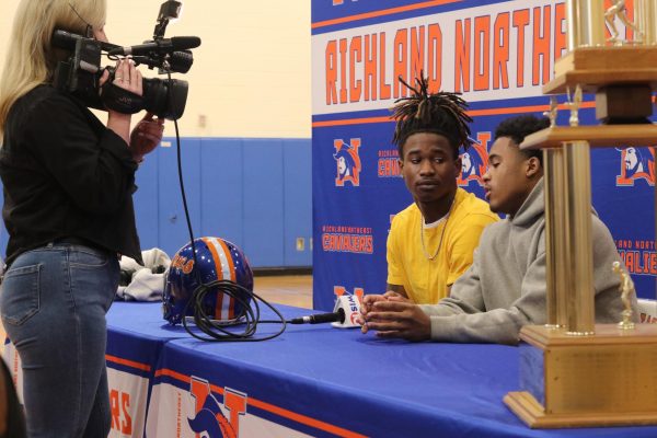 Local news station WIS-TV interviews Haliburton and Newsome.