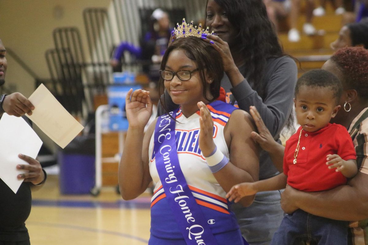 Senior Asia Walkes wins Coming Home Queen.