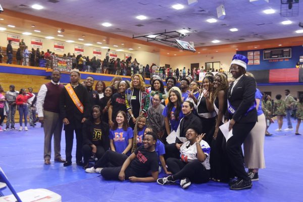 SGA poses with pageant winners, Principal Marlon Thomas, and guest speaker Nadia Rutherford. 