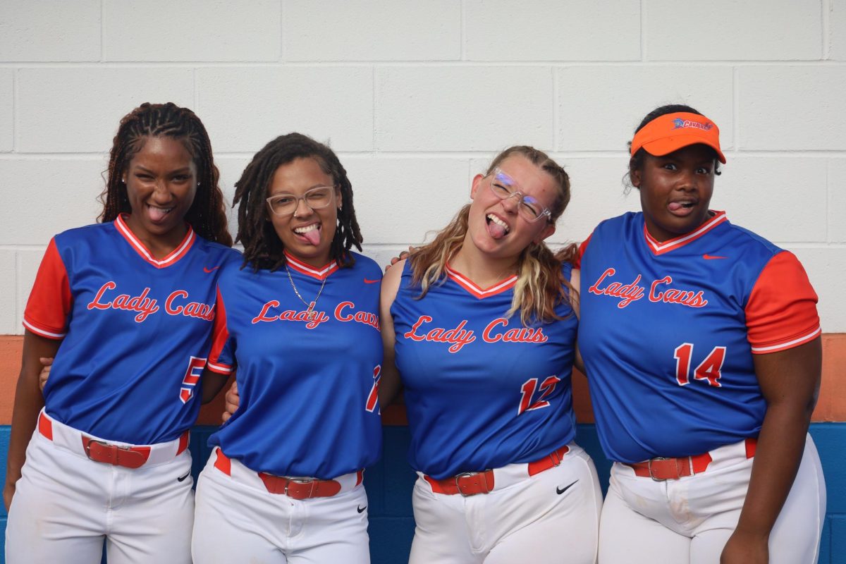 Seniors Saniya Fleming, McKenzie Wilson, Dayshana Miller, and Becca Chojnacki pose for photo.