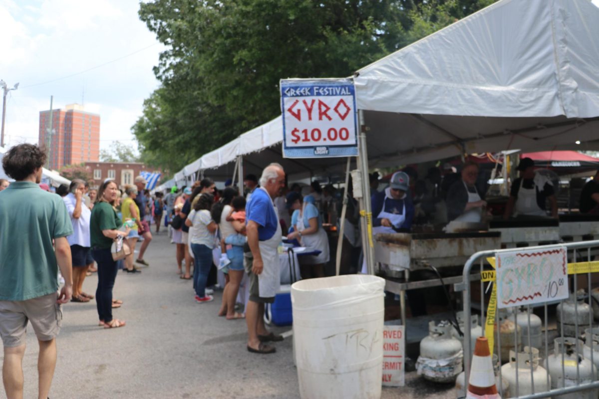Many Greek food was sevred at the event , including gyros. Gyros are usually a  meat wrapped pita bread, but can be vegetarian.  