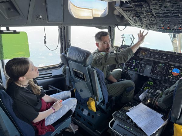 First-year cadet Fraya Lindsey, freshman, learns about the cockpit.