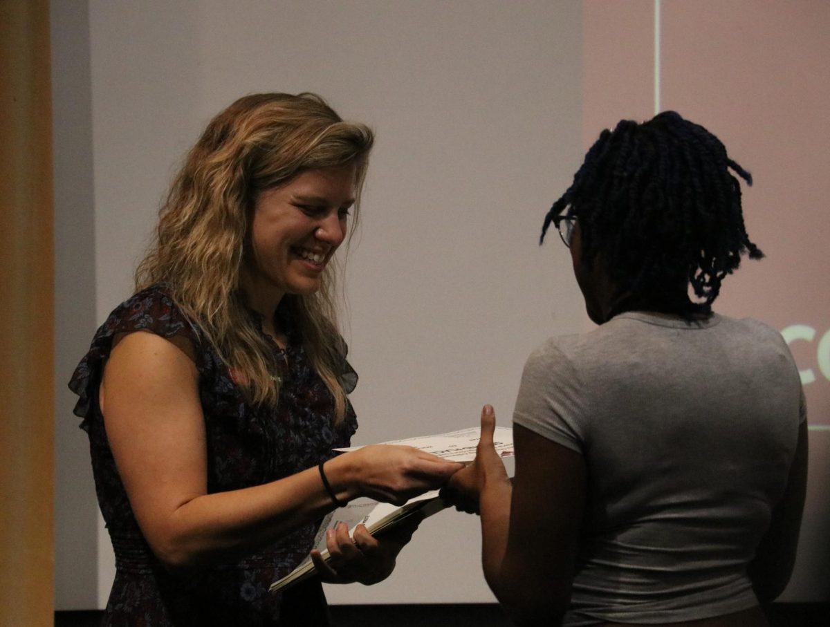 Junior Isis Bryan accepts her award for second place literary magazine nonfiction.
