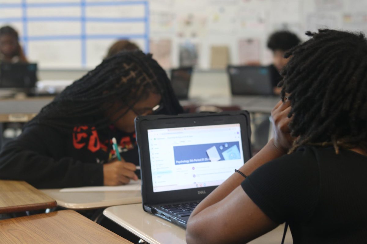 Students work on their assignments in Samuel Sims history class.