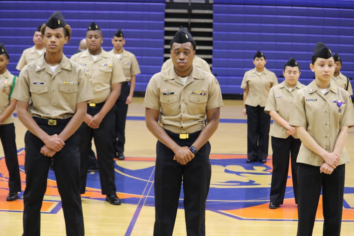 First and second squad in first Platoon stand at ease while waiting for the inspection to be completed.